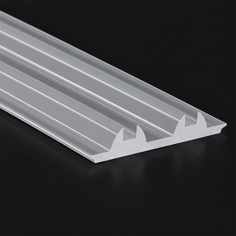 Close-up detail of Baiwei L527 extruded linear lens profile showing optical surface texture